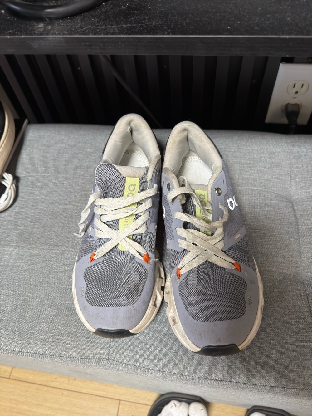 On Running Men's Gray and White Athletic Shoes with Orange Accents